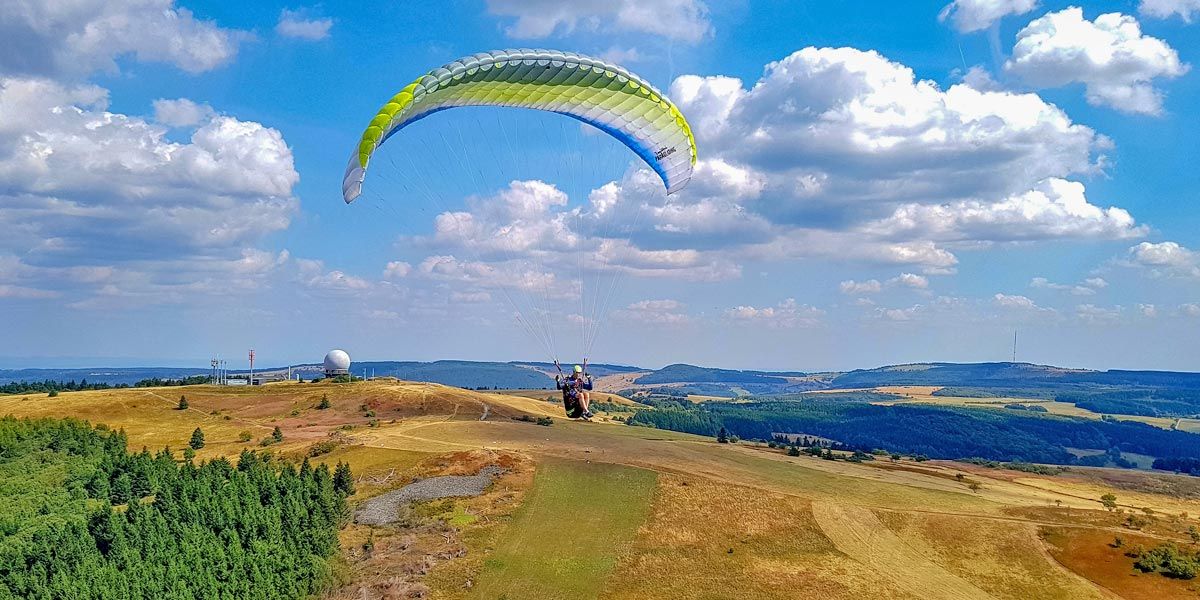 Paraglider flying above the Rhön